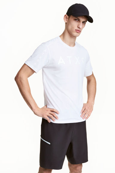 Knee-length sports shorts